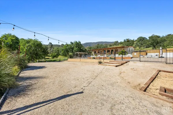 an aerial view of a house with a mountain view