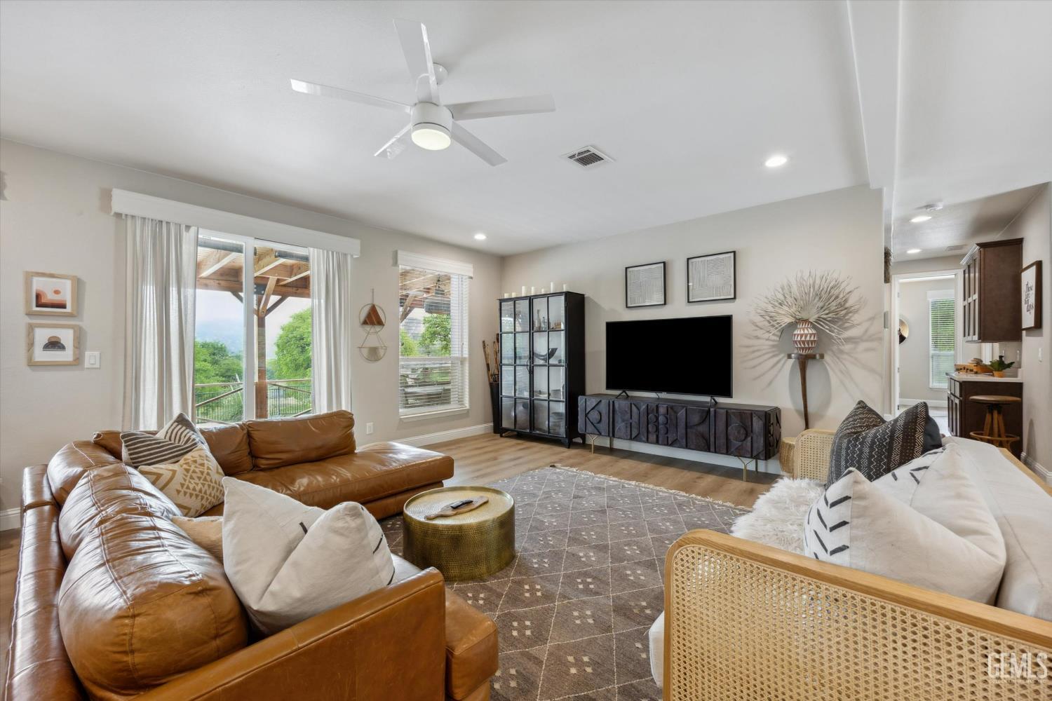 Undisclosed Address Keene, CA 93531 - Photo 9 of 60 a living room with furniture and a flat screen tv