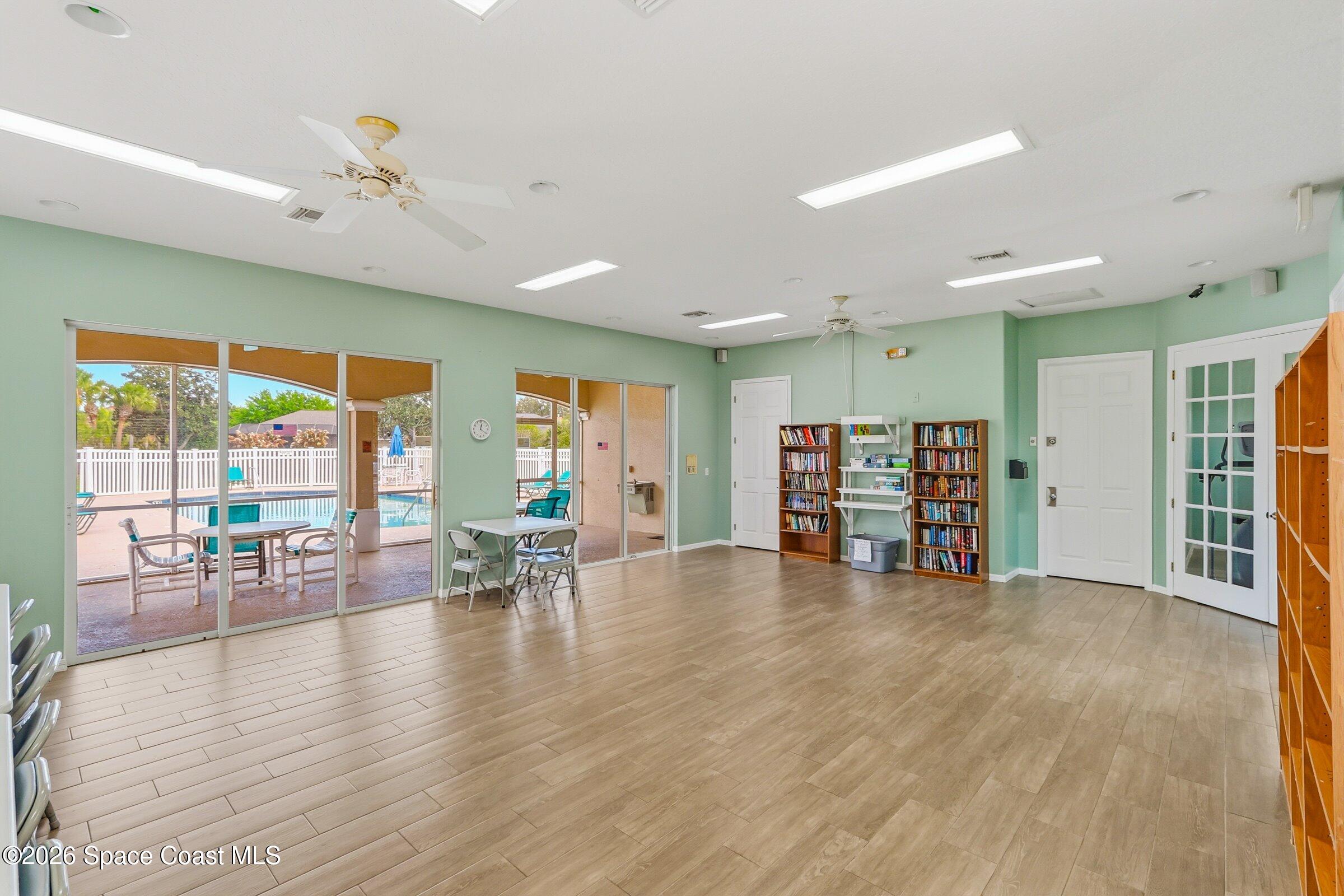 1825 Ficus Point Drive Melbourne, FL 32940 - Photo 39 of 48 a view of an empty room with furniture and a potted plant