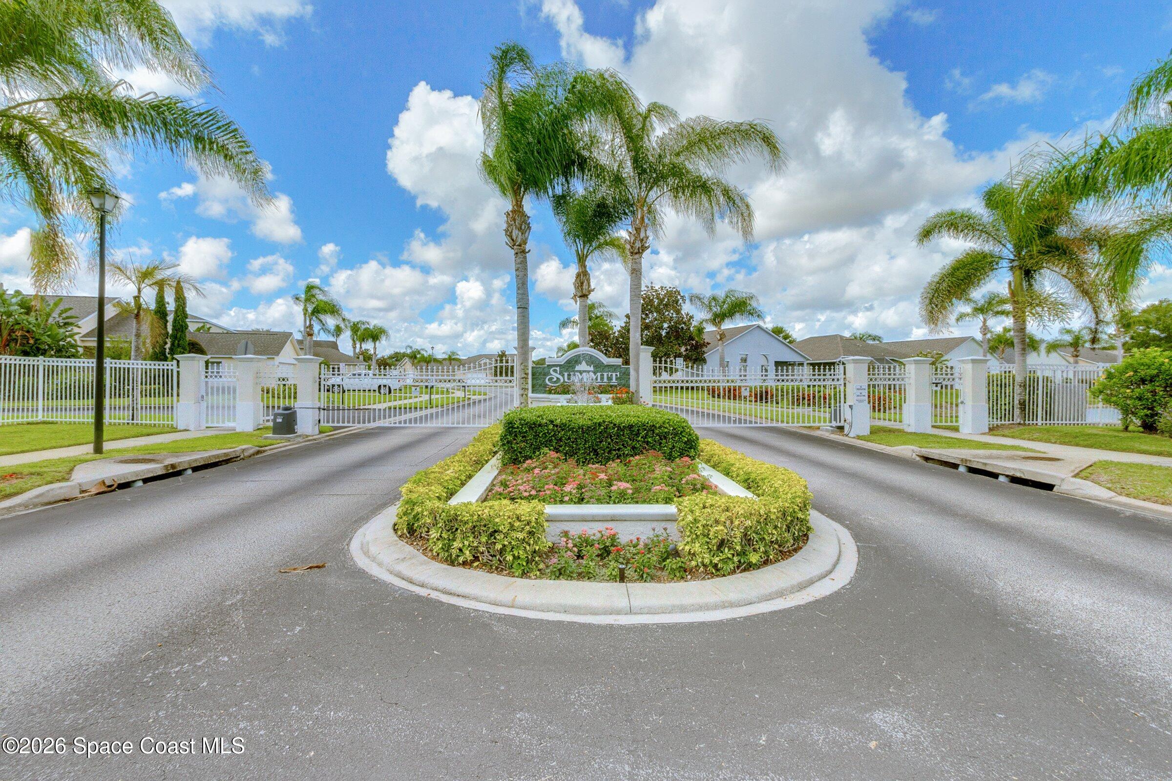 1825 Ficus Point Drive Melbourne, FL 32940 - Photo 44 of 48 a house with palm tree in front of it