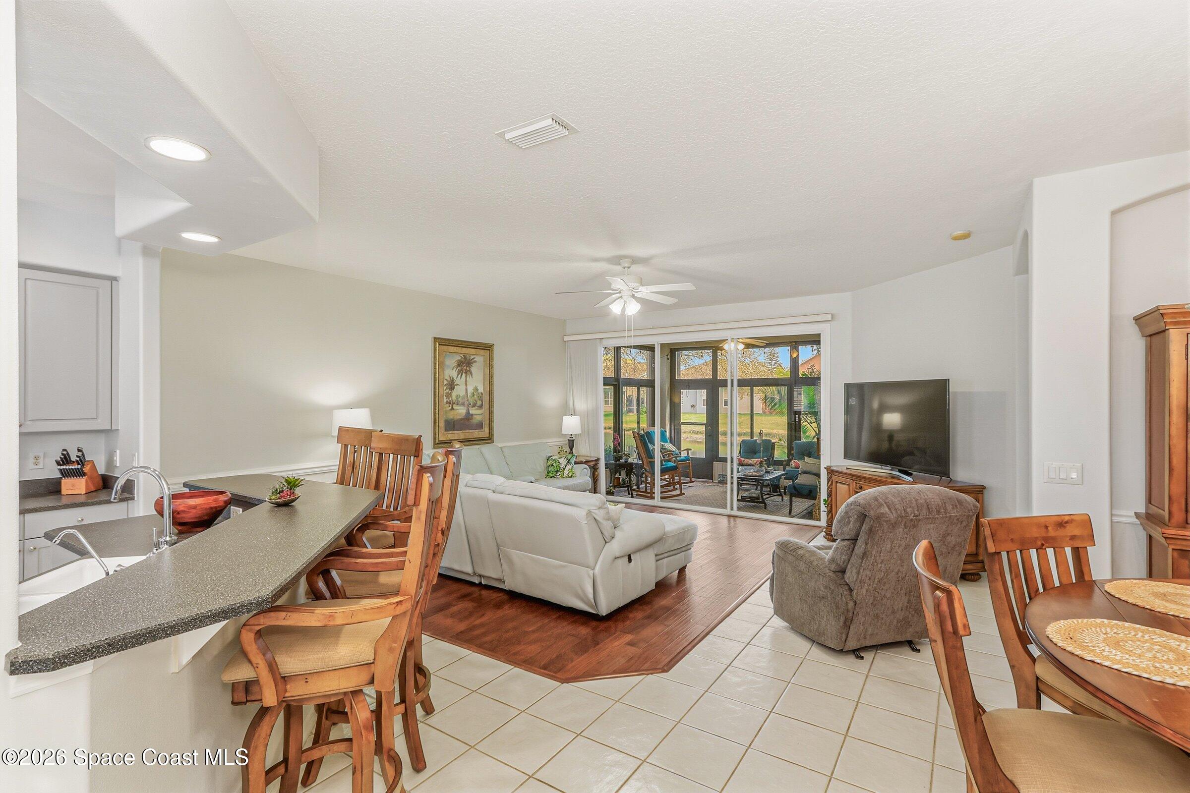 1825 Ficus Point Drive Melbourne, FL 32940 - Photo 9 of 48 a living room with furniture and a flat screen tv