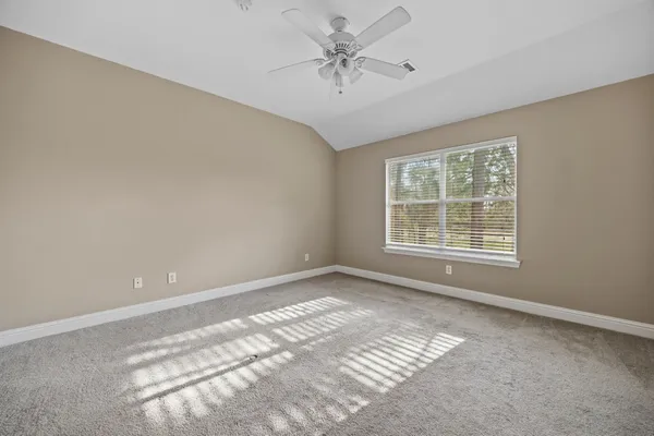 a bathroom with a sink a large mirror and a bathtub