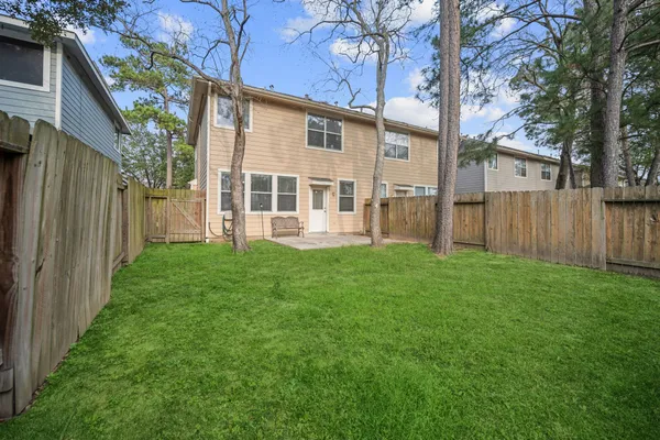 a house view with a garden space