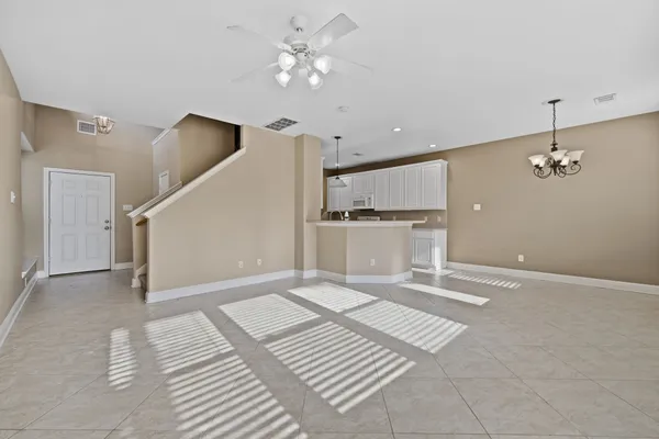 a view of a livingroom with a ceiling fan