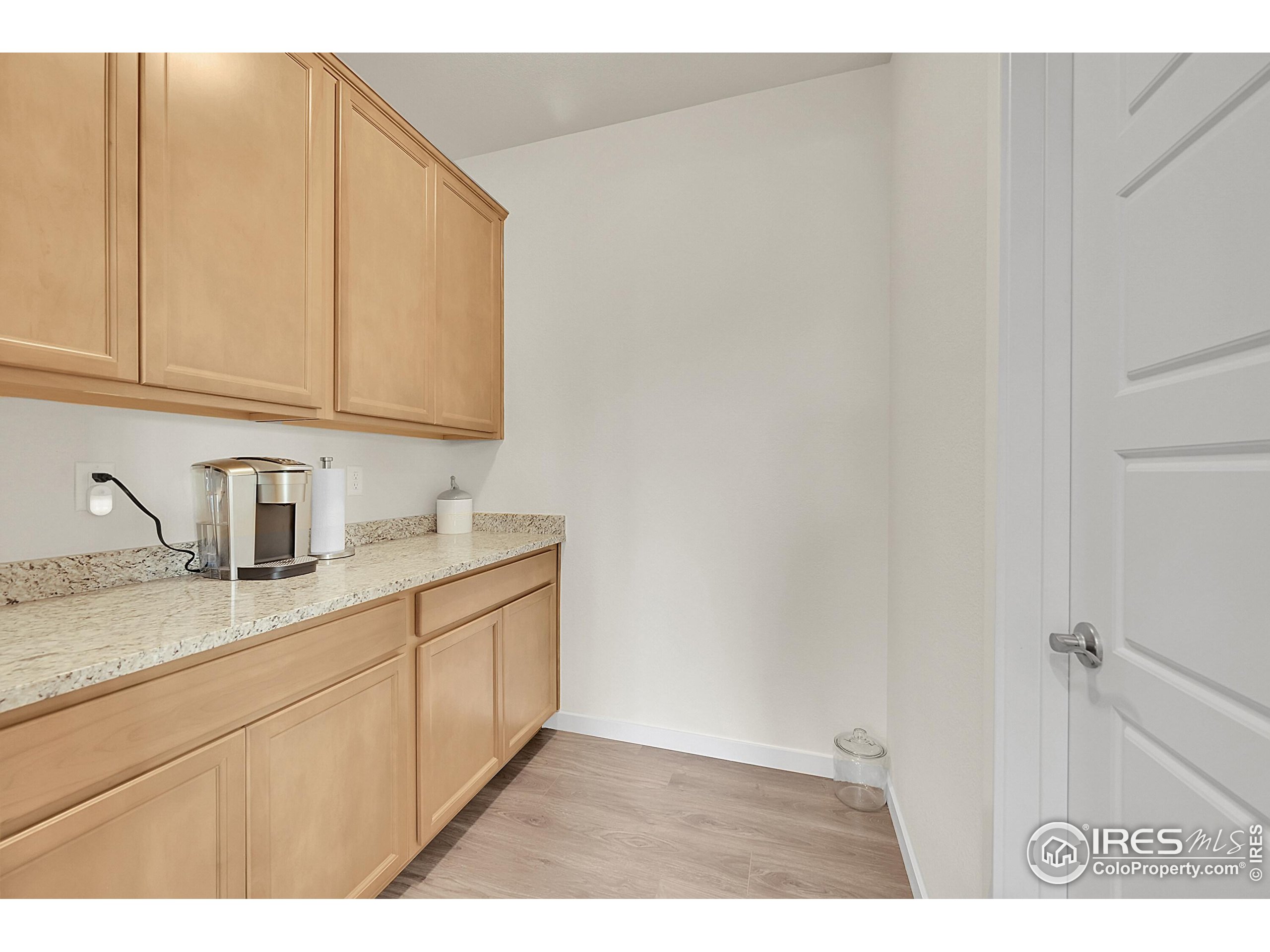 2538 Doe Rdg Way Johnstown, CO 80534 - Photo 12 of 33 a kitchen with sink and cabinets