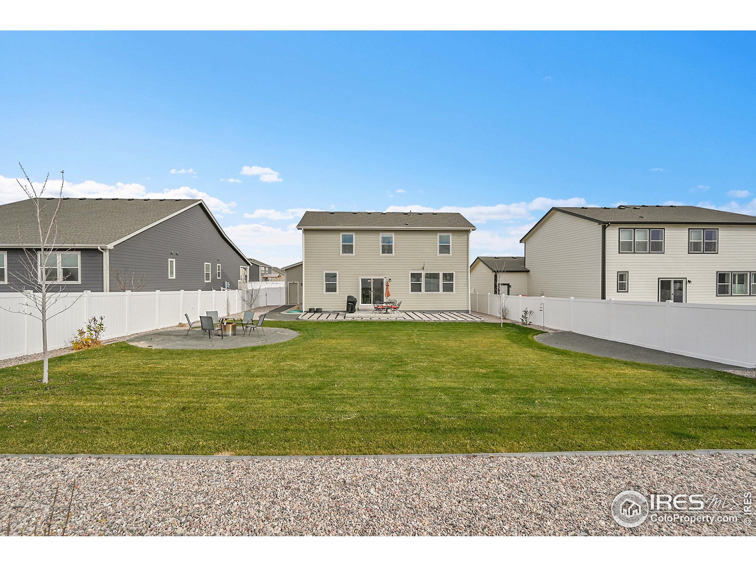 2538 Doe Rdg Way Johnstown, CO 80534 - Photo 29 of 33 a view of a house with a big yard