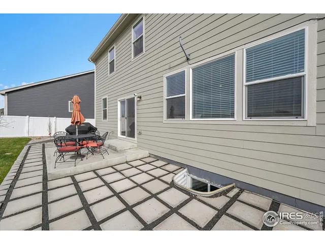 a backyard of a house with seating space