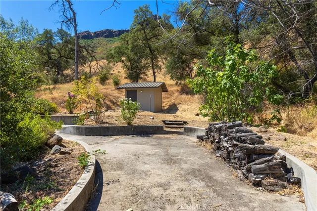 a view of a backyard of the house