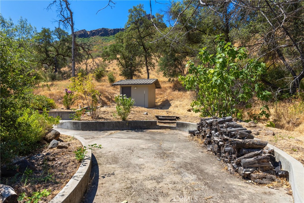1926 Honey Run Road Chico, CA 95928 - Photo 13 of 24 a view of a backyard with plants and lake view