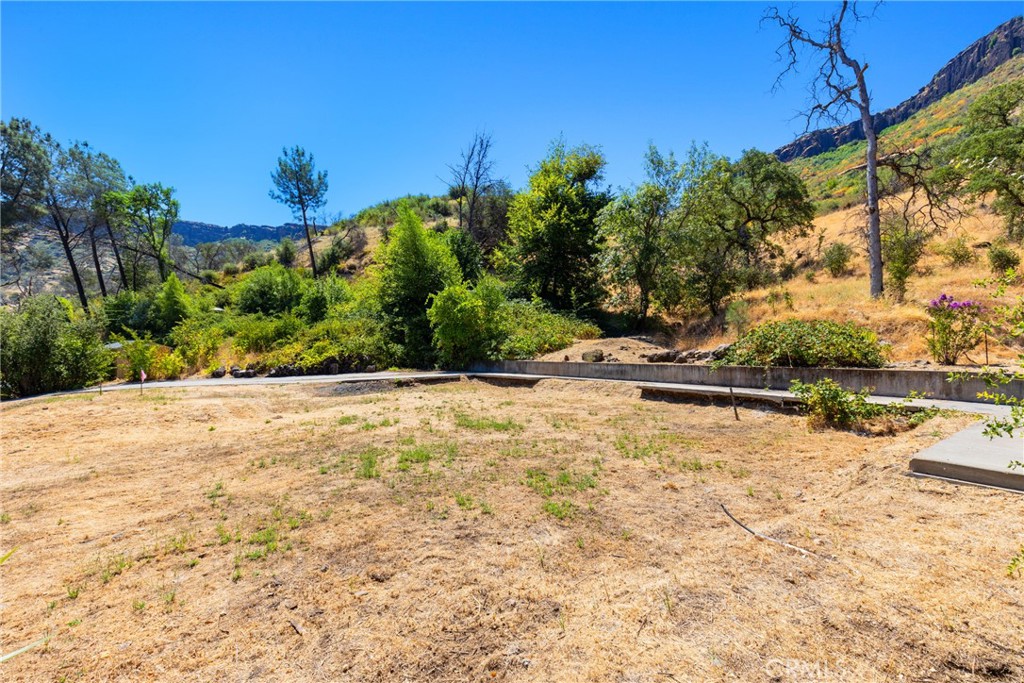 1926 Honey Run Road Chico, CA 95928 - Photo 2 of 24 a view of a yard with wooden fence