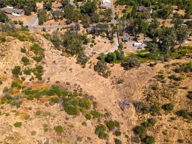 an aerial view of residential house with parking space