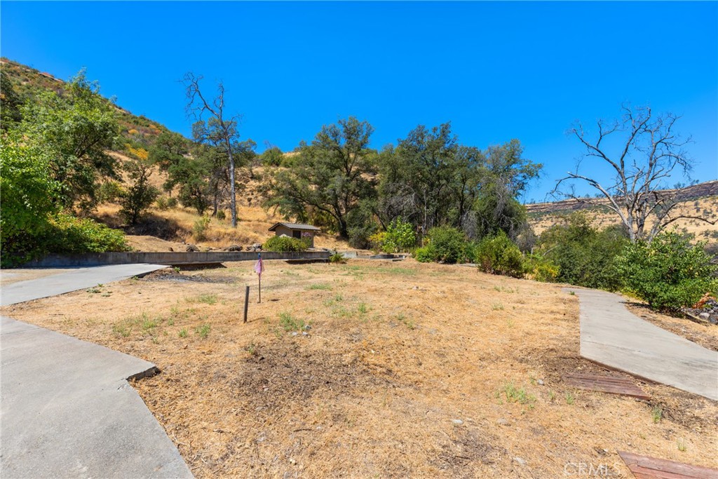 1926 Honey Run Road Chico, CA 95928 - Photo 3 of 24 a view of a yard with wooden fence