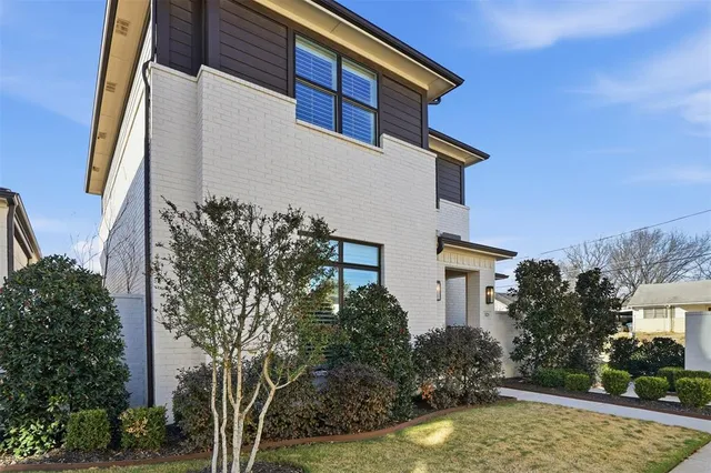 a backyard of a house with lots of green space
