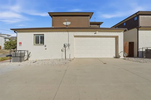 an aerial view of a house with a outdoor space