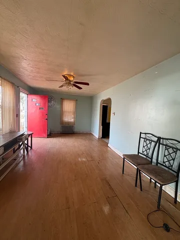 a livingroom with furniture and a window