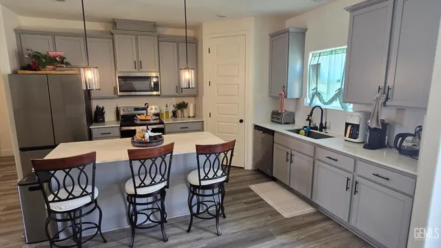 a bedroom with a bed and a ceiling fan