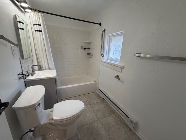 5938 Dunham Road Downers Grove, IL 60516 - Photo 11 of 16 a white toilet sitting next to a bath tub shower