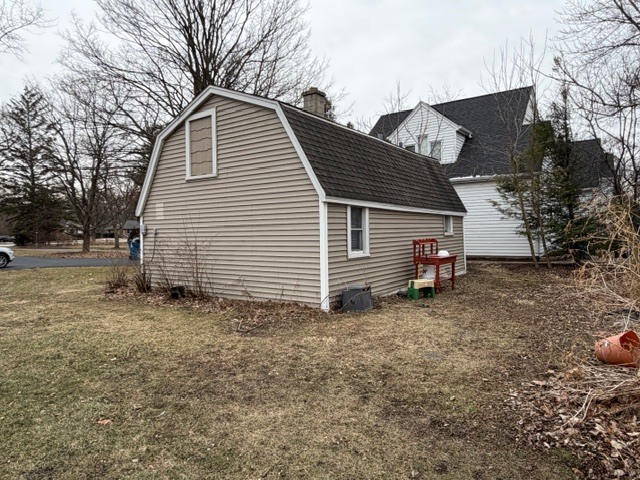 5938 Dunham Road Downers Grove, IL 60516 - Photo 16 of 16 a view of a house with a yard