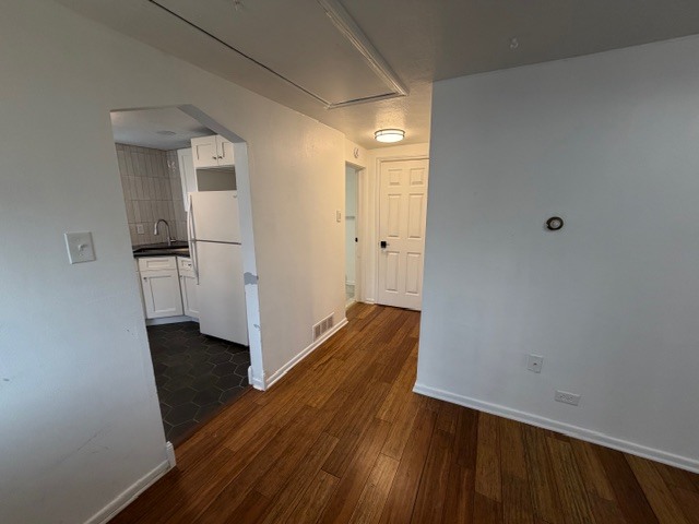 5938 Dunham Road Downers Grove, IL 60516 - Photo 2 of 16 a view of a hallway with wooden floor