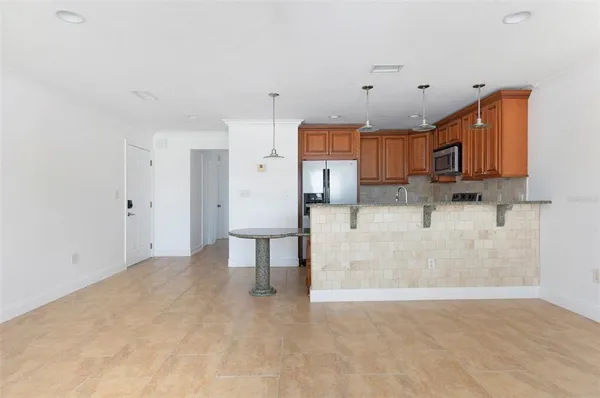 a view of a kitchen with a sink