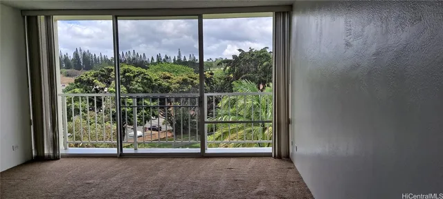a view of a garden with an outdoor space
