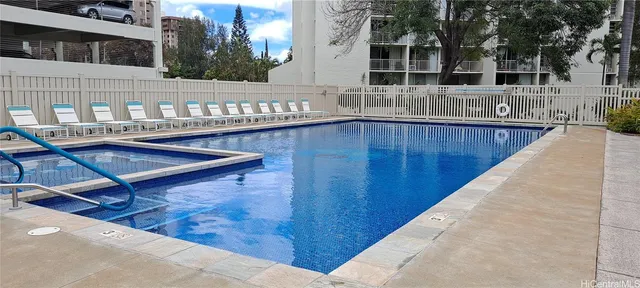 a view of empty room with a fireplace
