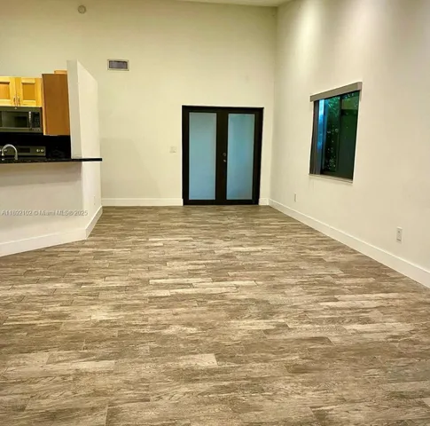 a view of a room with a sink