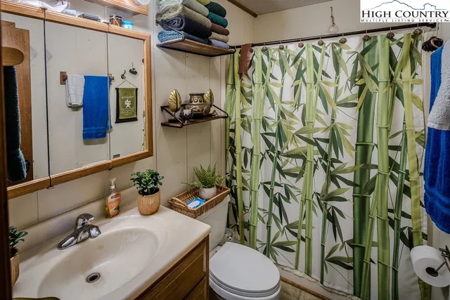 a view of a porch with wooden floor