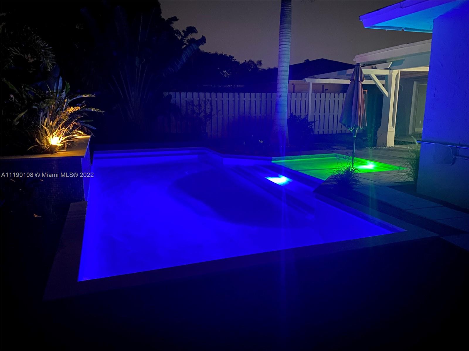 4641 Armadillo Street Boca Raton, FL 33428 - Photo 38 of 60 a view of a golf course with a swimming pool
