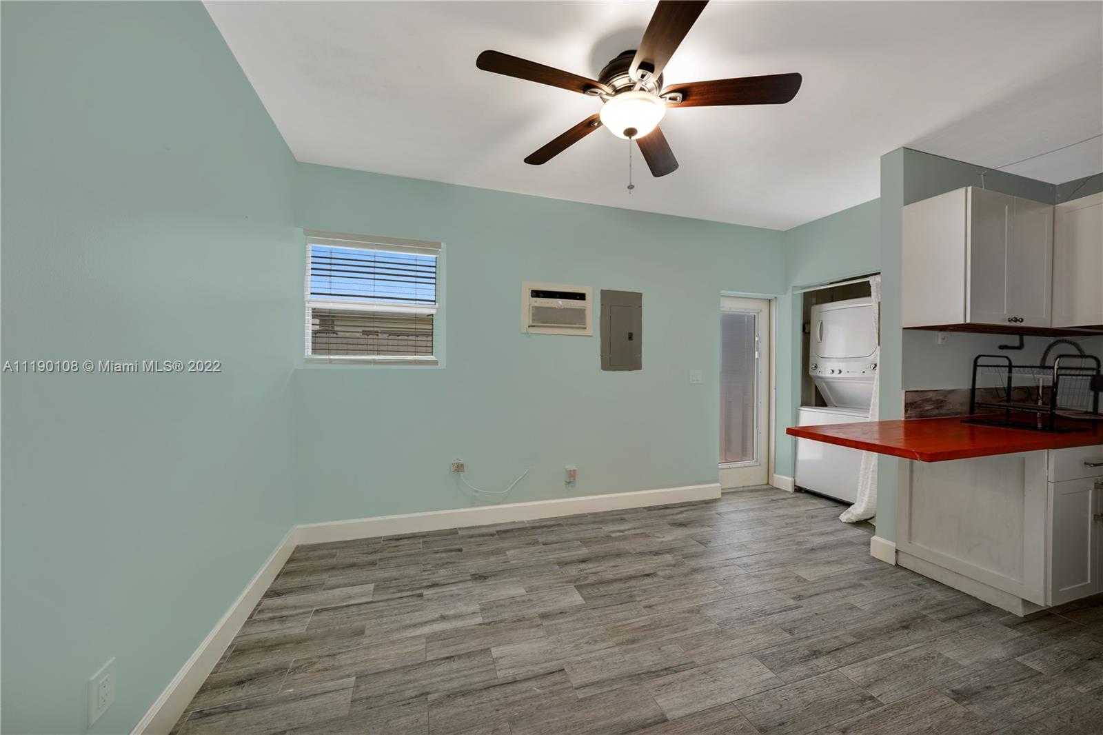 4641 Armadillo Street Boca Raton, FL 33428 - Photo 44 of 60 a view of room with hardwood floor and ceiling fan