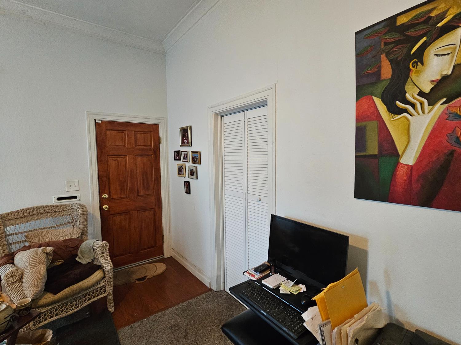 450 C Street Fresno, CA 93706 - Photo 10 of 22 a bedroom with a bed and furniture