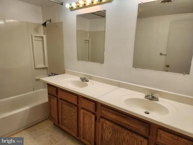 a bathroom with a sink and a bathtub