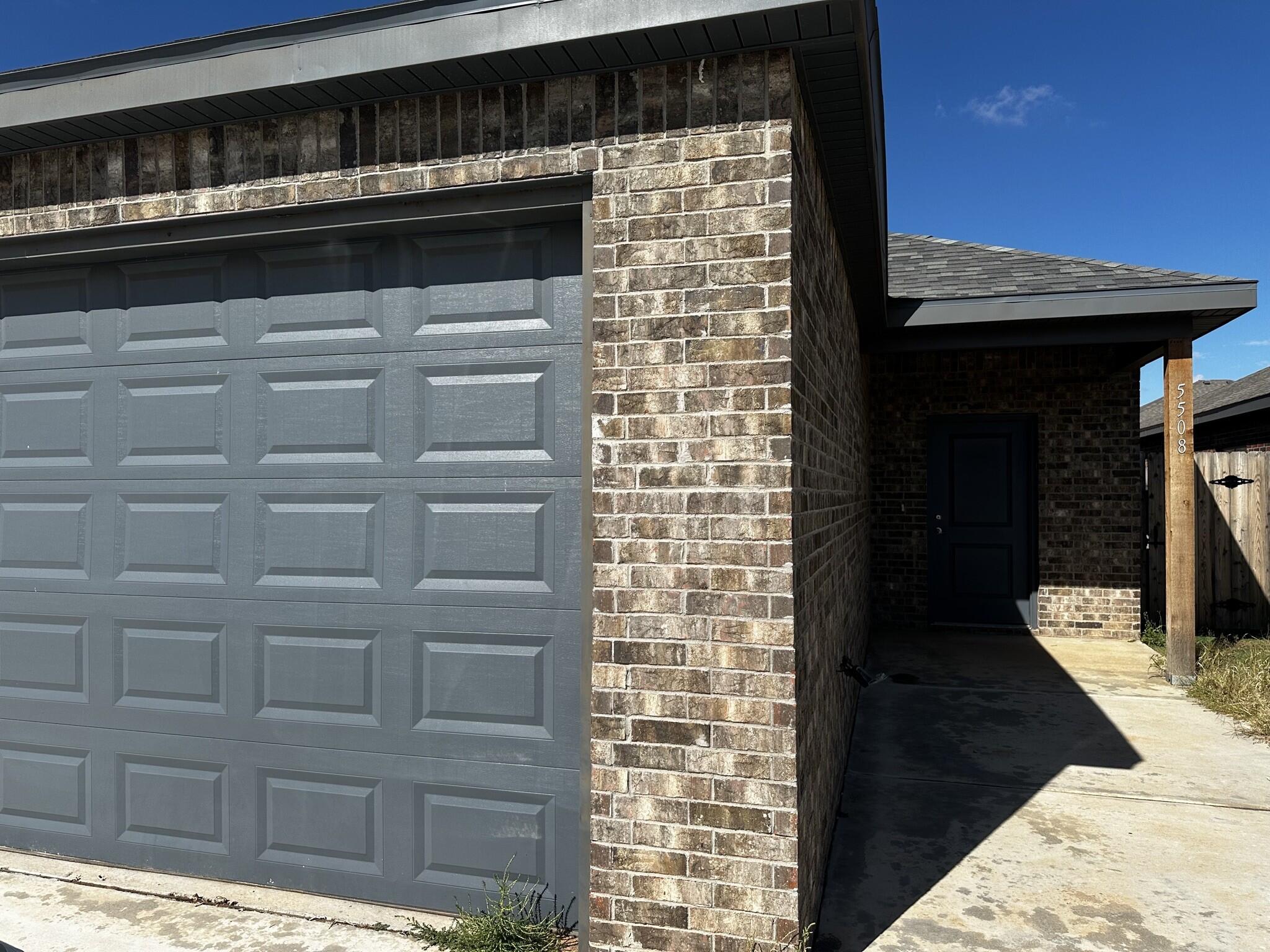 5508 Itasca Street, Unit A Lubbock, TX 79416 - Photo 1 of 1 a view of a entryway door front of house