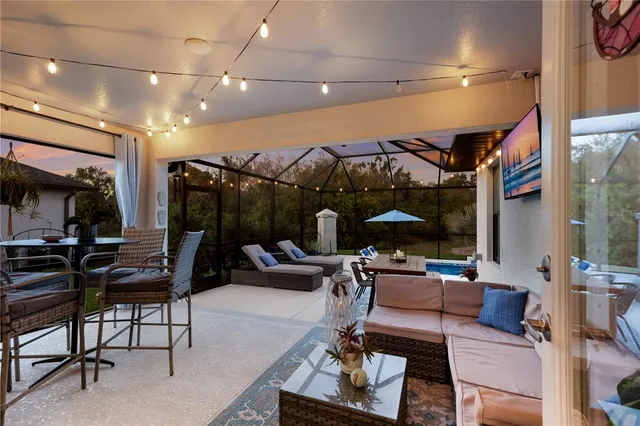 a room with lots of furniture and musical instruments