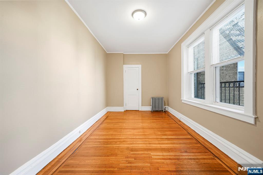 2 Washburn Place, Unit 202 Caldwell, NJ 07006 - Photo 14 of 16 a view of an empty room with a window