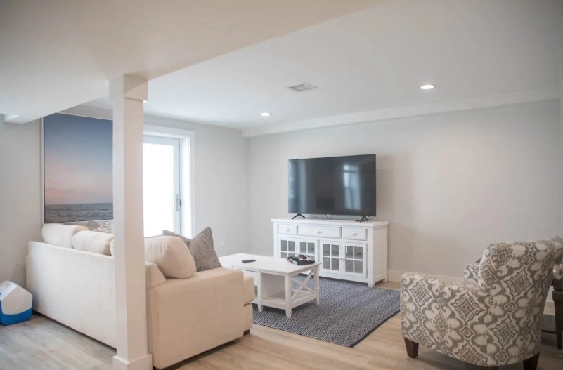 11 Miller Lane Nantucket, MA 02554 - Photo 16 of 21 a living room with furniture and a flat screen tv