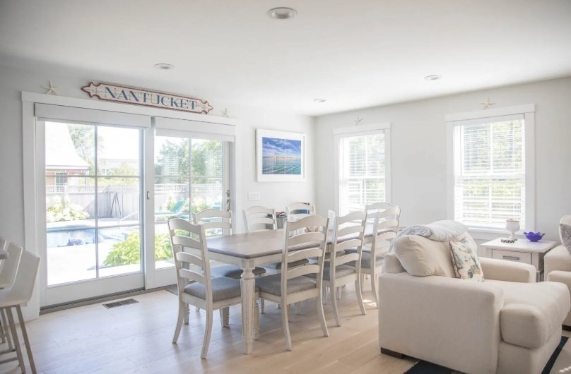 11 Miller Lane Nantucket, MA 02554 - Photo 5 of 21 a dining room with furniture and large windows