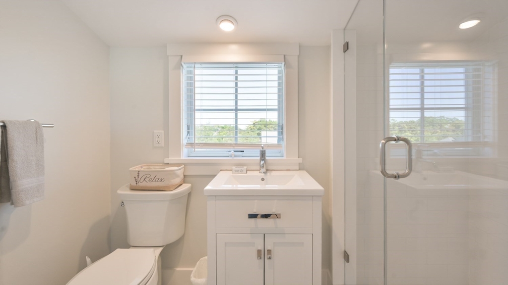 11 Miller Lane Nantucket, MA 02554 - Photo 9 of 21 a bathroom with a sink toilet and shower
