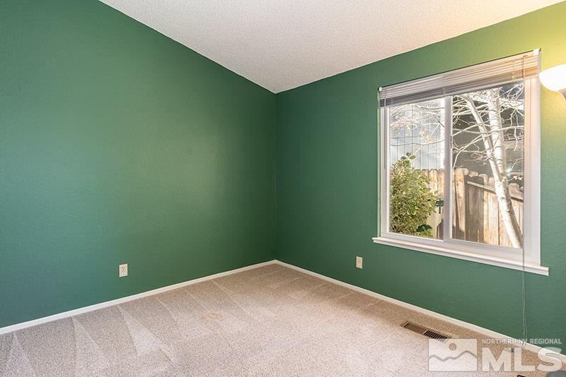 6082 Bankside Way Reno, NV 89523 - Photo 12 of 17 a view of a room that has a window in it