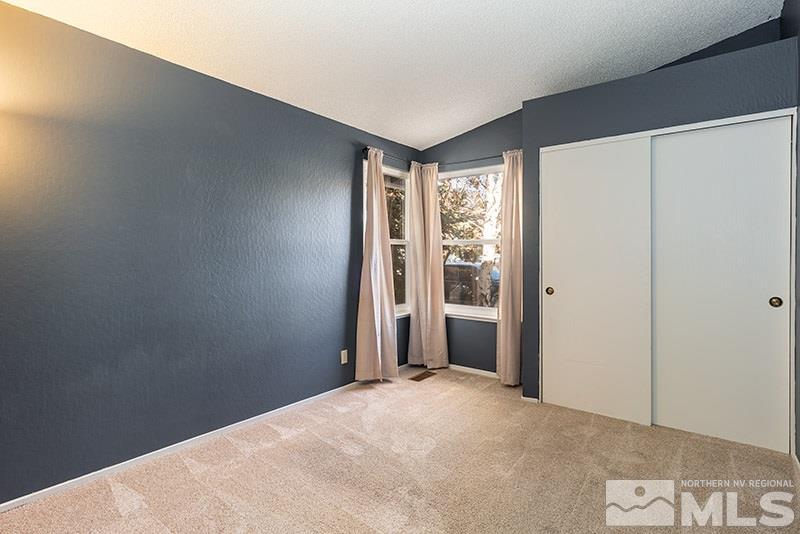 6082 Bankside Way Reno, NV 89523 - Photo 13 of 17 a view of a room with a large window
