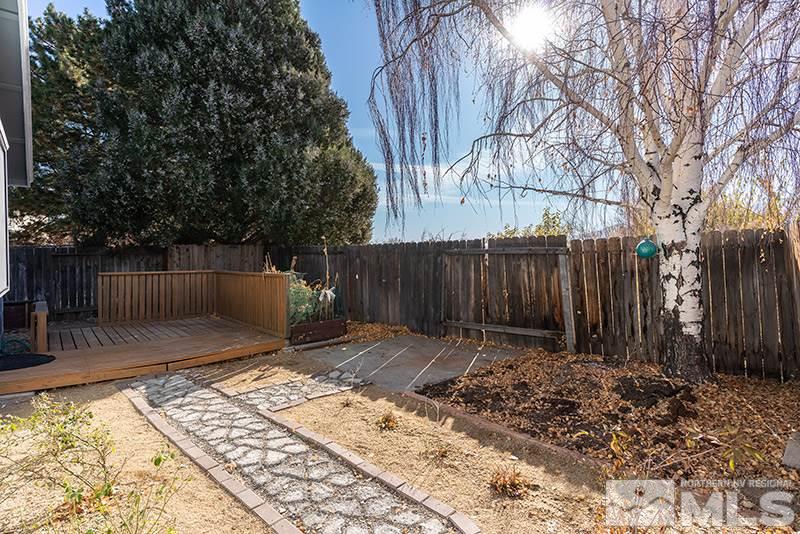 6082 Bankside Way Reno, NV 89523 - Photo 15 of 17 a backyard of a house with lots of green space
