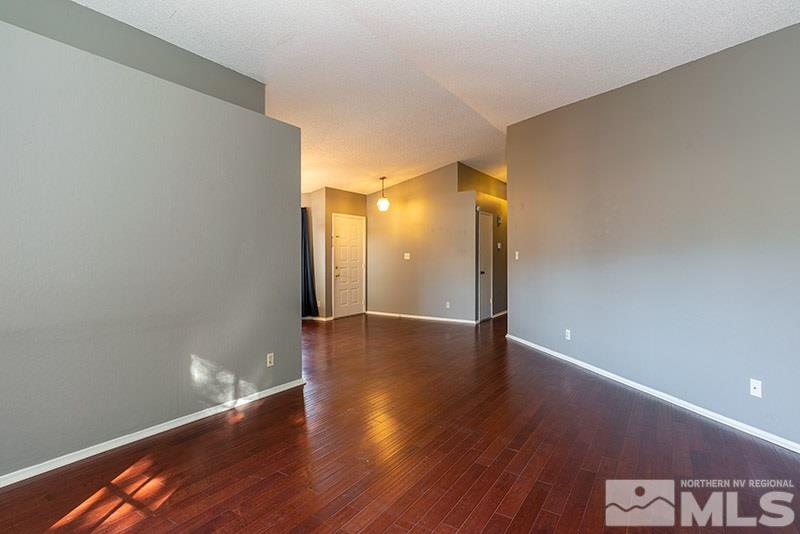 6082 Bankside Way Reno, NV 89523 - Photo 9 of 17 a view of a room with wooden floor