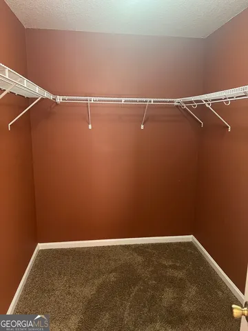 a view of a room with racks on the wall