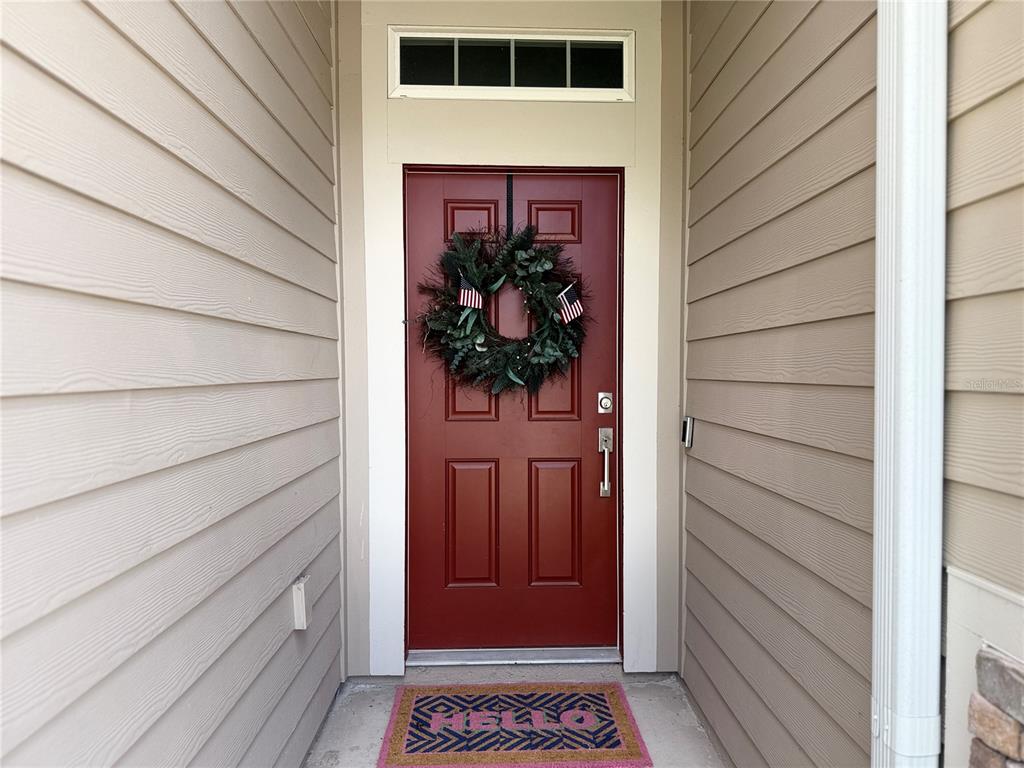 7656 Southwest 74th Loop Ocala, FL 34474 - Photo 5 of 95 a view of a entryway door of the house
