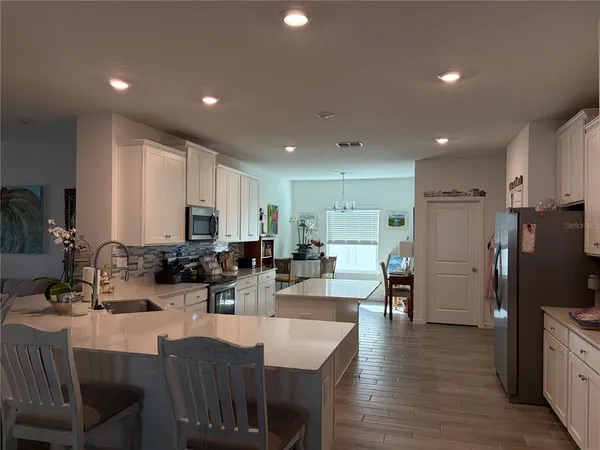 a view of a dining room with furniture