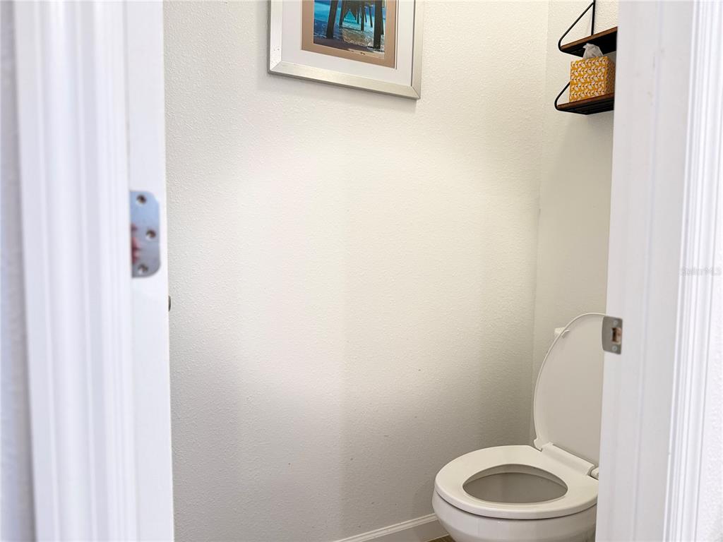 7656 Southwest 74th Loop Ocala, FL 34474 - Photo 71 of 95 a white toilet sitting next to a white sink