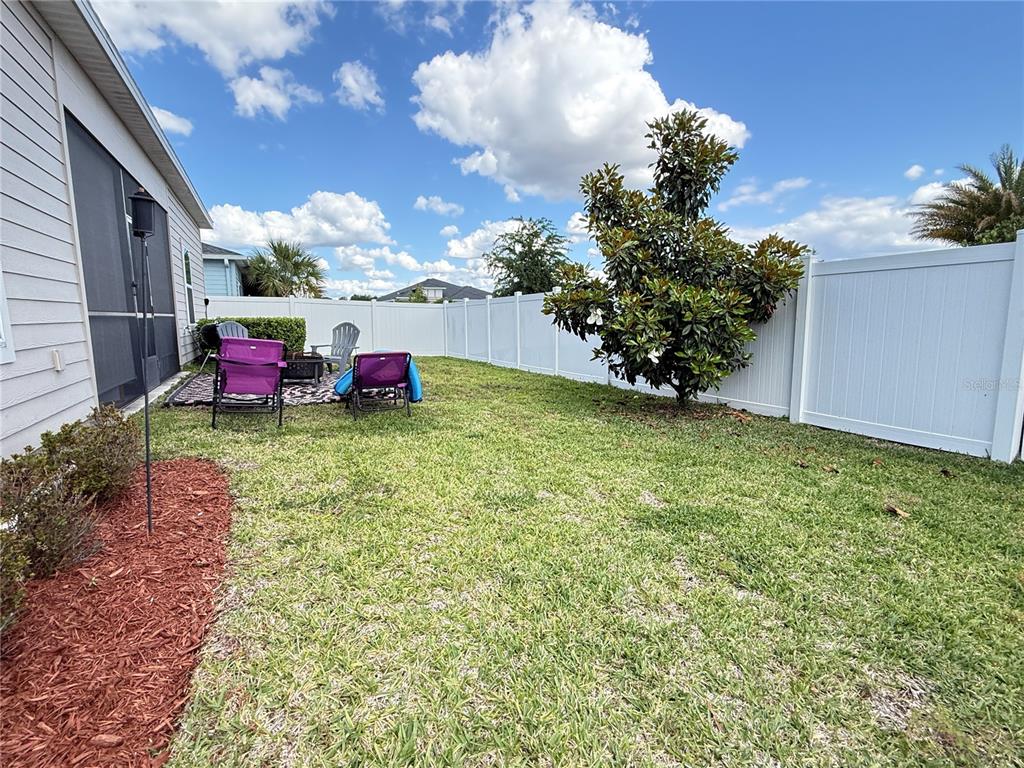 7656 Southwest 74th Loop Ocala, FL 34474 - Photo 88 of 95 a view of an outdoor space yard and front view of a house