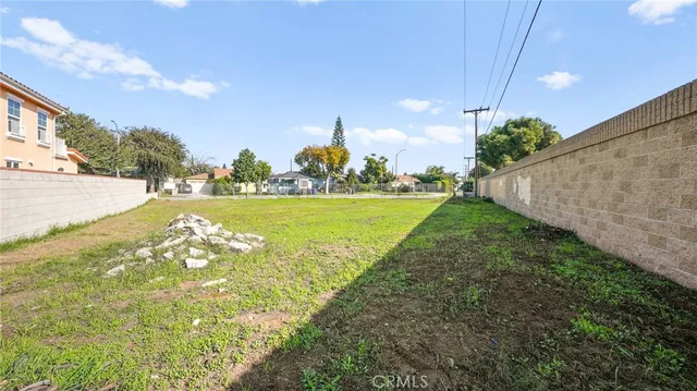 a view of a garden with an ocean