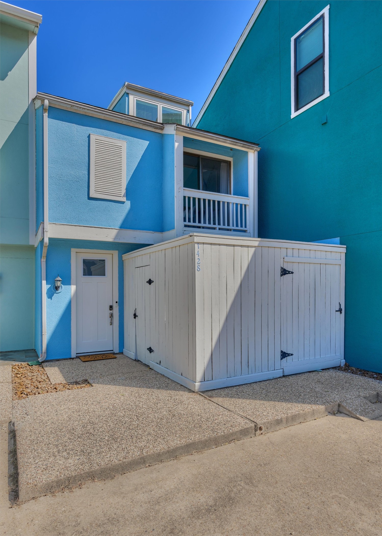 1428 Bowsprit Point Willis, TX 77318 - Photo 8 of 47 The colors of the properties here give Key West vibes for a great weekend vacation feel.