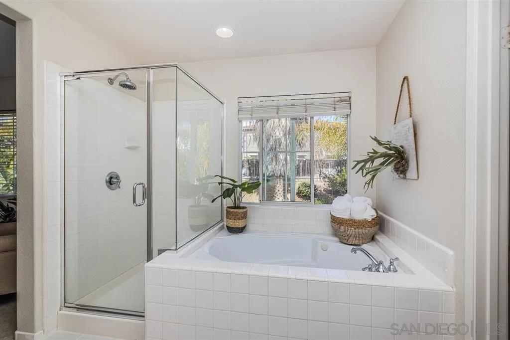 1088 Greenway Road Oceanside, CA 92057 - Photo 13 of 25 a bathroom with a sink and a shower